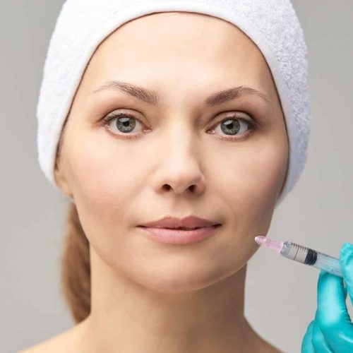 Facial injecting treatment. Skin platelet. Prp rich plasma injection. Beauty woman. Doctor gloves